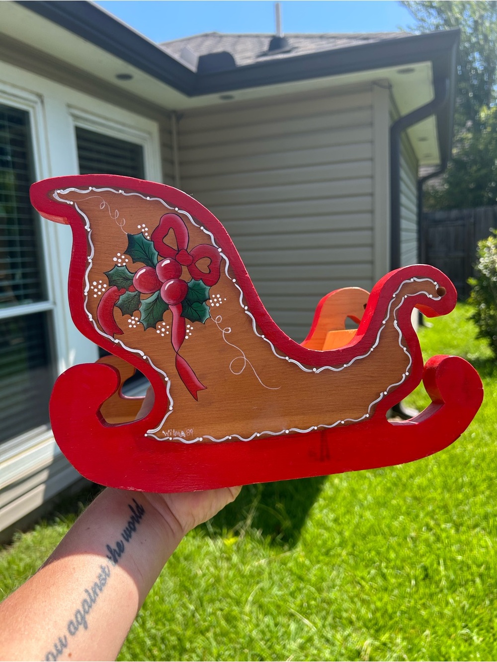 Festive Red and Wood Holiday Sleigh Décor